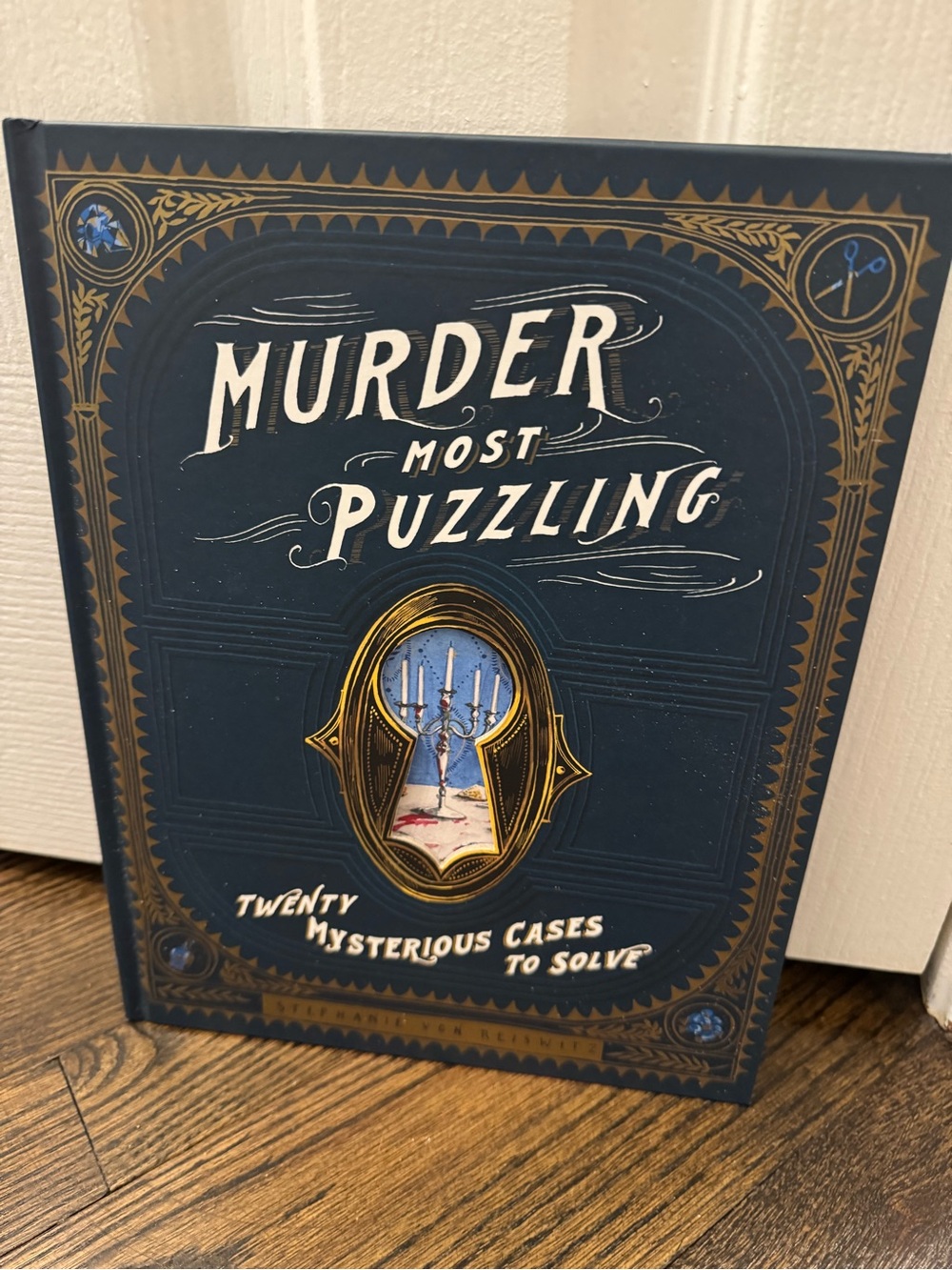 Murder Most Puzzling book - Navy and Gold